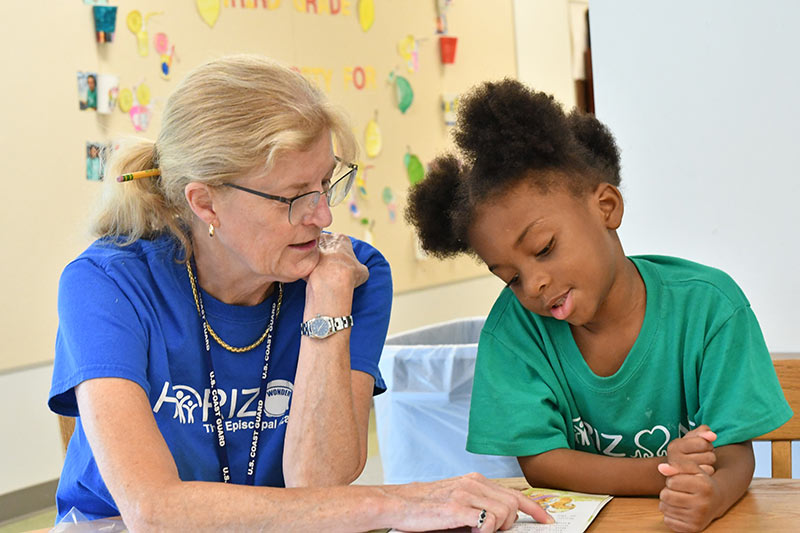 Young girl working with a teacher in the Horizons program